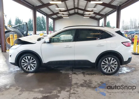 2021 Ford Escape Titanium Hybrid z USA, uszkodzony, nr VIN 1FMCU9DZ7MUB16787